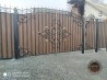 Ворота распашные кованые с профнастилом и калиткой